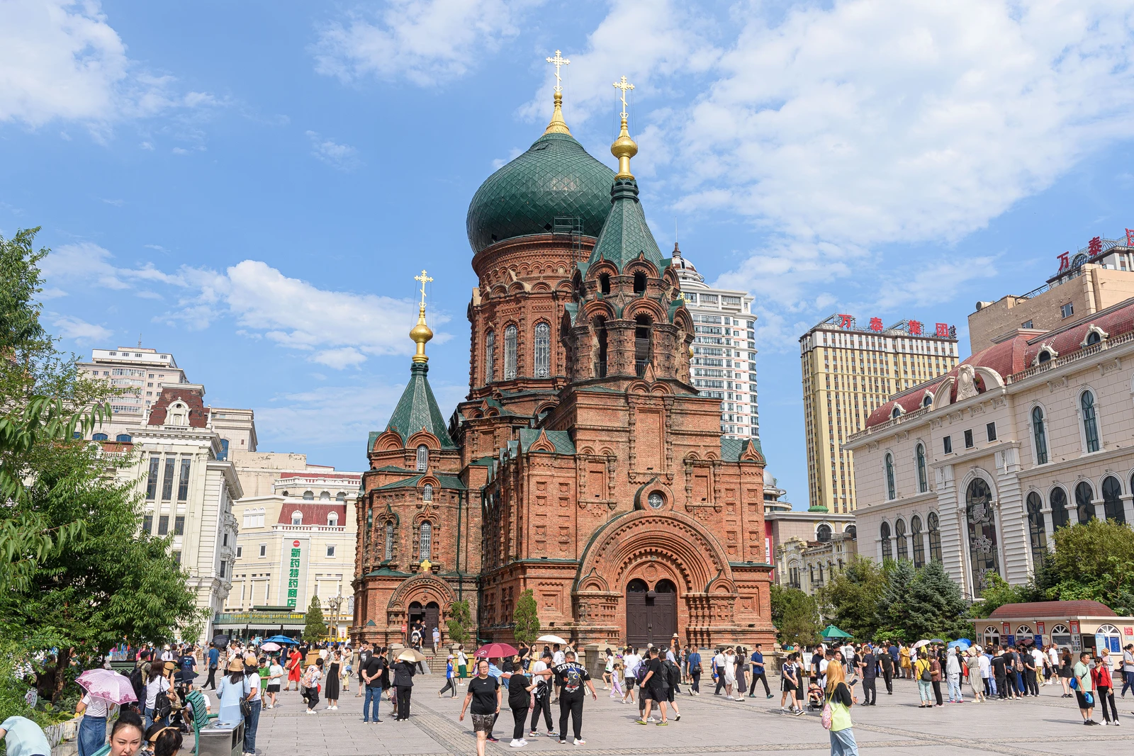 Saint Sophia Cathedral and its surrounding square in Harbin beneath blue summer skies