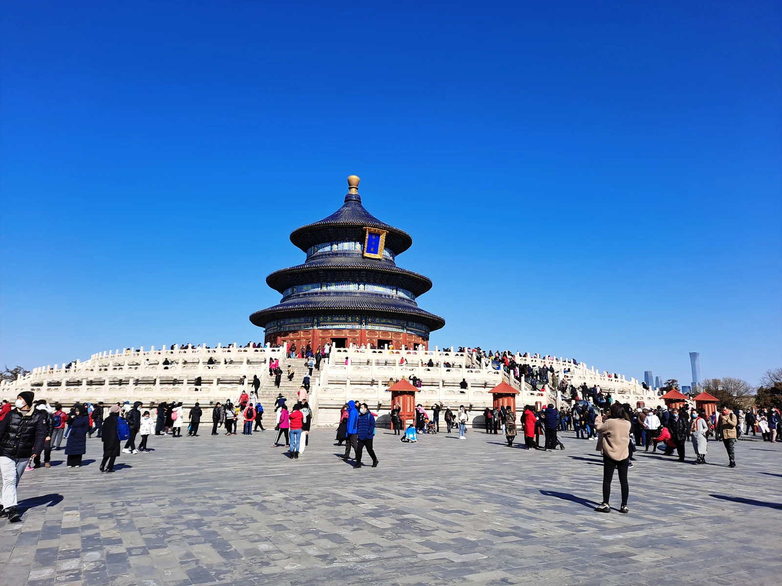 The complete Hall of Prayer for Good Harvests and its marble terraces beneath a vivid blue sky